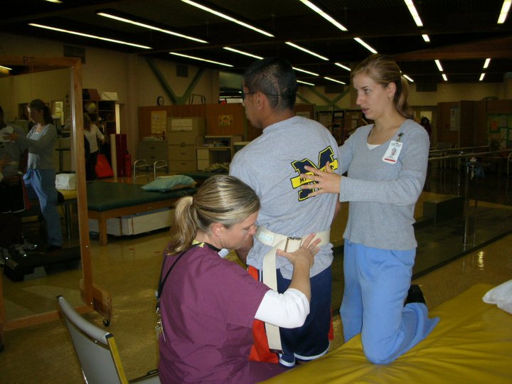 A former physical therapist receives PT treatment from colleagues.