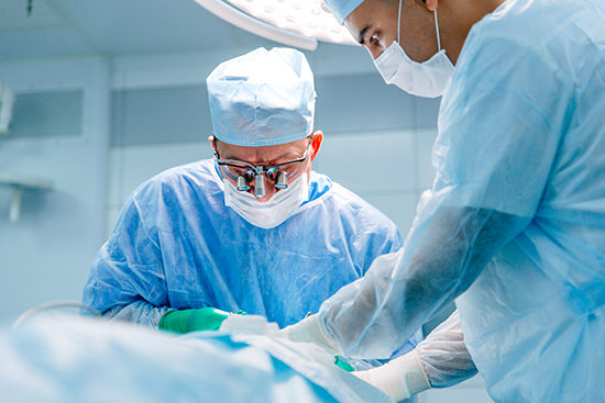 It's important to get a second opinion before brain surgery. A neurosurgeon operates on a patient in the OR. 