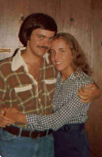 A young couple hug in a photo dating back to the 1970s.