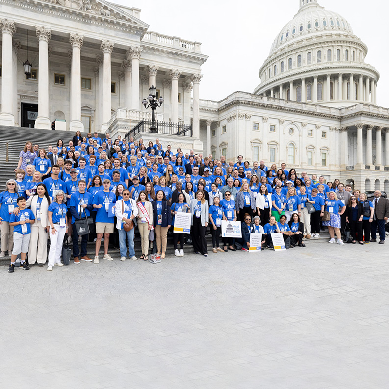 Advocates at Head to the Hill stand in front of the Capitol Building in Washington, DC.